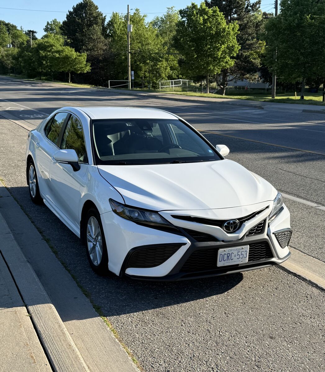 White Toyota Camry front exterior view